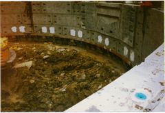 Coombs site, showing main iron cutting ring on base of concrete liners that dug its way downwards under the weight of the rings above and with the aid of some hydraulic pressure in the form of rams pushing down on the top layer.